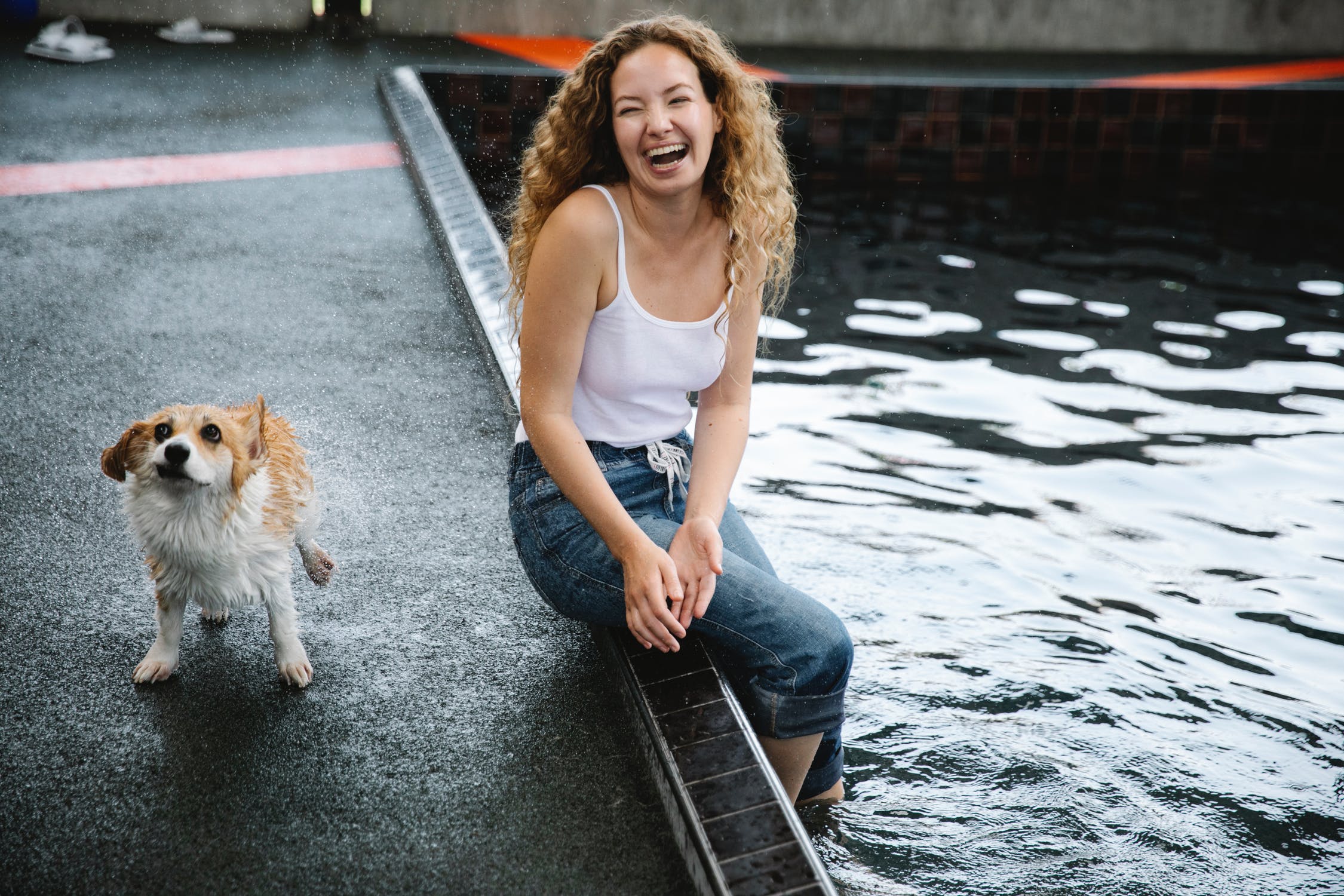 Girl and Corgi at rec pool
